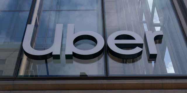 Minnesota Gov. Tim Walz vetoes bill mandating higher pay, job security for Uber/Lyft drivers 2 Uber sign