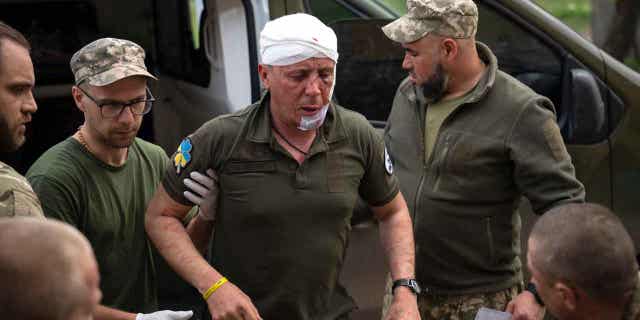Head of Russian Wagner group says his force lost 20,000 men in battle for Bakhmut 2 Ukrainian soldiers