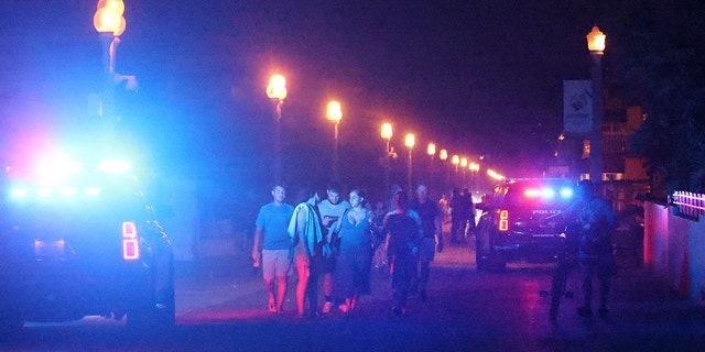 Police lights near the boardwalk