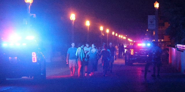 Police lights near the boardwalk