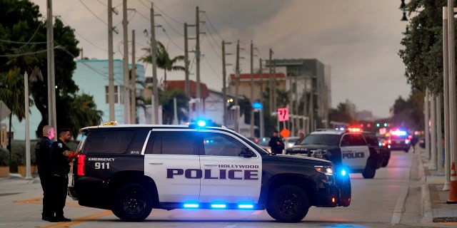 A police car at an intersection