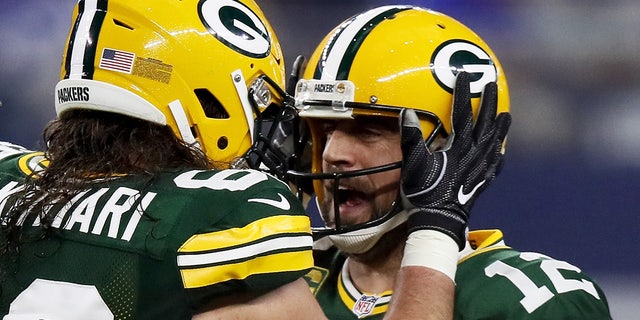 David Bakhtiari with Aaron Rodgers