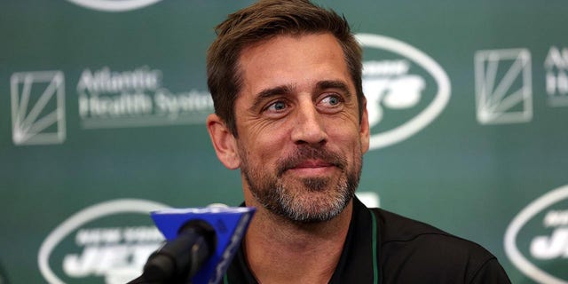 Aaron Rodgers talking to reporters