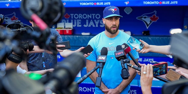 Anthony Bass in the dugout