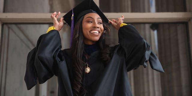 Areanah Preston in a cap and gown