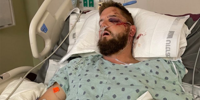 Aric Hutchinson shown in his hospital bed.