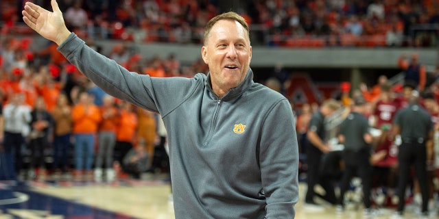 Hugh Freeze appears at an Auburn Tigers basketball game