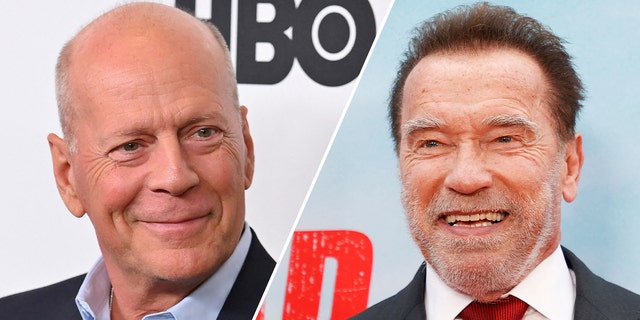 Bruce Willis grins on the red carpet in a blue shirt and black jacket, looking to his left split Arnold Schwarzenegger smiles in a white shirt, red tie, and dark suit and looks to his left 