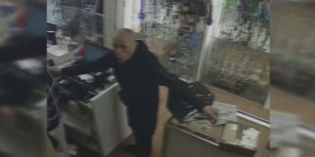 armed robbery suspect still shot from security camera