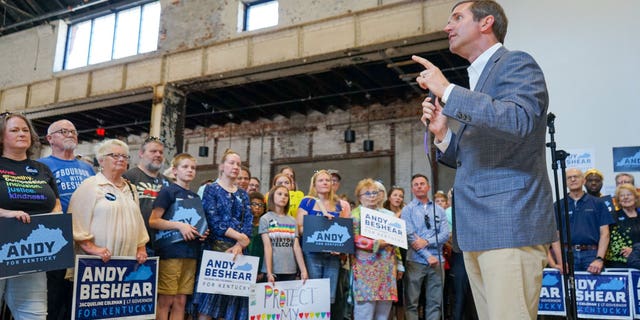 Democratic Kentucky Gov. Andy Beshear speaking to a crowd