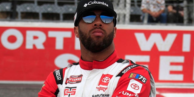 Bubba Wallace looks on