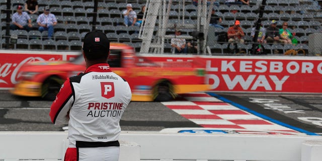 Bubba Wallace looks on