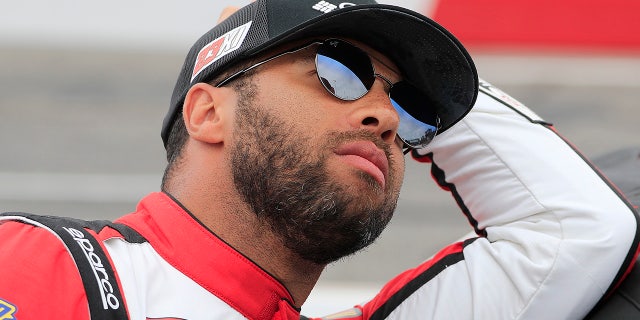 Bubba Wallace looks on