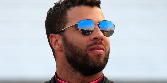 Bubba Wallace looks on