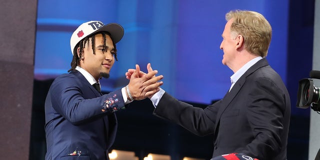 CJ Stroud shakes hands with Roger Goodell