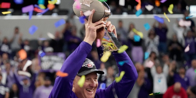 Chris Klieman celebrating