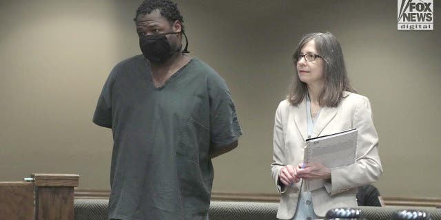 Jogger Eliza Fletcher accused murderer stands in a court with his lawyer