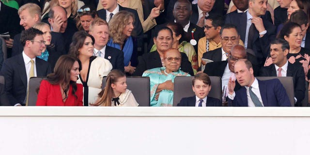 Catherine, Princess of Wales, Princess Charlotte of Wales, Prince George of Wales and Prince William, Prince of Wales are seen during the Coronation Concert