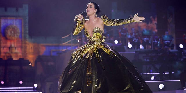 Katy Perry rocks gold gown at coronation concert for King Charles