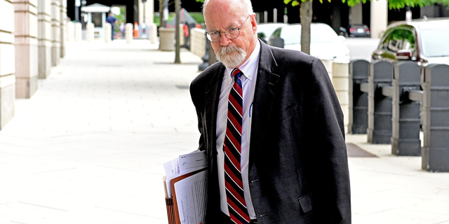 John Durham walks into federal building