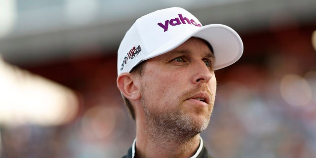 Denny Hamlin looks on