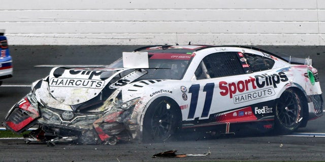 Denny Hamlin with crashed car