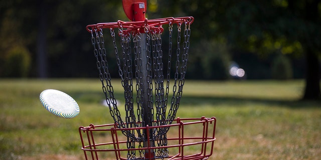 A disc slips into the basket