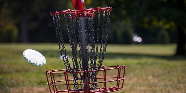 A disc slips into the basket