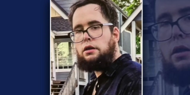 Dylan Robinson in glasses