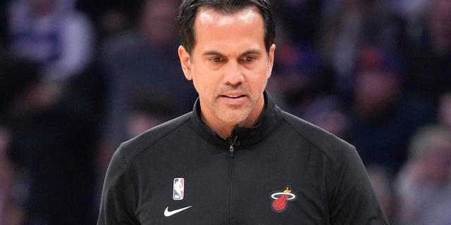 Erik Spoelstra looks down