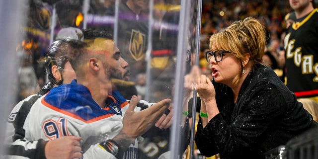 Evander Kane blows a kiss to a fan