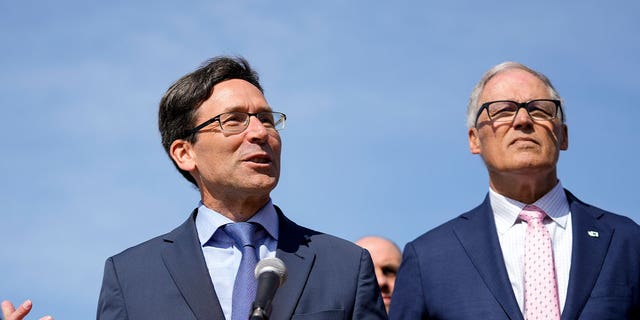 Washington Attorney General Bob Ferguson and governor Jay Inslee