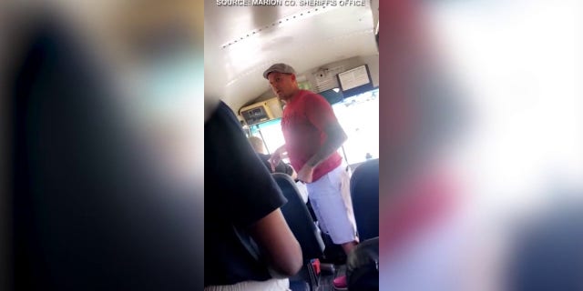 Florida man seen hitting school bus aide