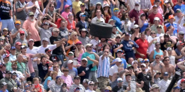 Tire flies into stands