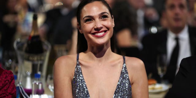 Gal Gadot smiles for a photo