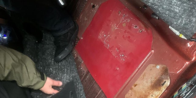 hidden access panel to gas tan