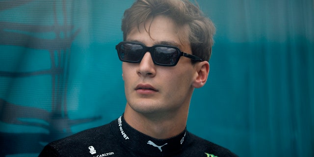 George Russell looks on