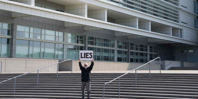 George Santos pleads not guilty to federal charges during first