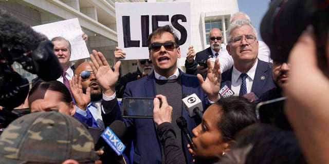 U.S. Rep. George Santos leaves the federal courthouse in Central Islip