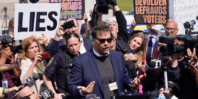 US Rep. George Santos leaves the federal courthouse in Central Islip