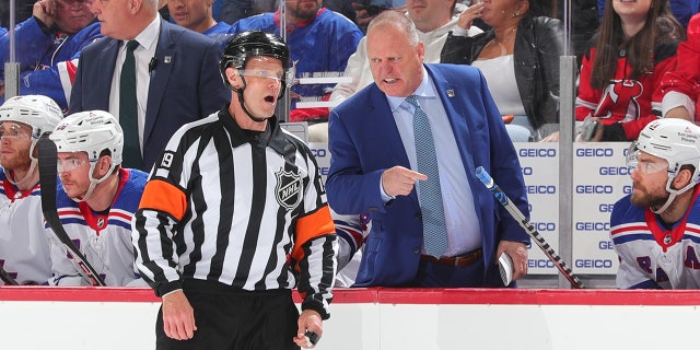 Gerard Gallant talks to a referee