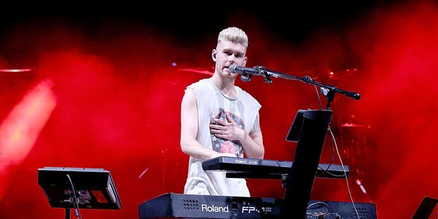 colton dixon singing at keyboard