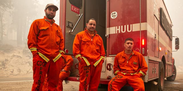 Group of incarcerated men working as firefighters