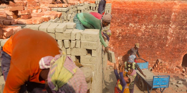 Child labor in brick factory in Bangladesh
