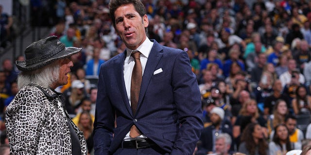 Bob Myers takes a dive with James Goldstein