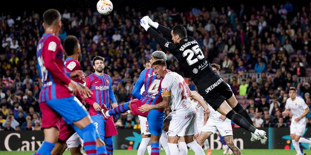 Sergio Rico makes a save