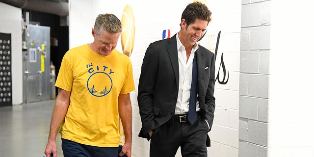 Bob Myers and Steve Kerr walk into the arena