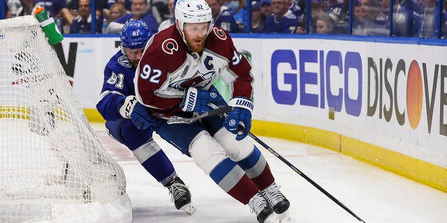 Gabriel Landeskog skates around the net