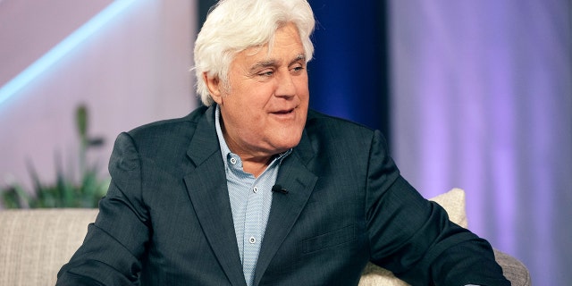 Jay Leno on "The Kelly Clarkson Show" in a blazer speaking on stage