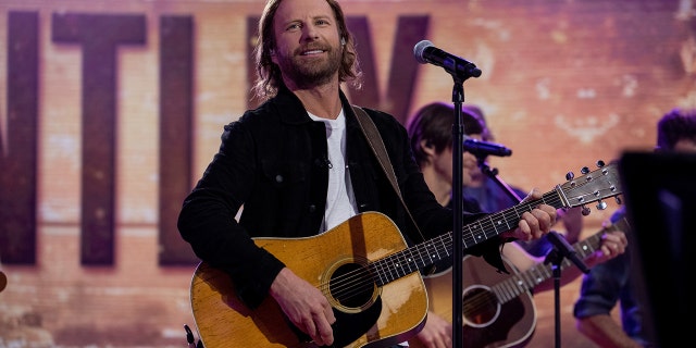 Dierks Bentley on stage at the TODAY show with a guitar